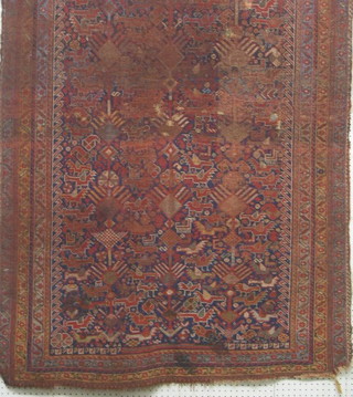 A Caucasian rug with multi-row borders, (heavily in wear)  70" x 44"