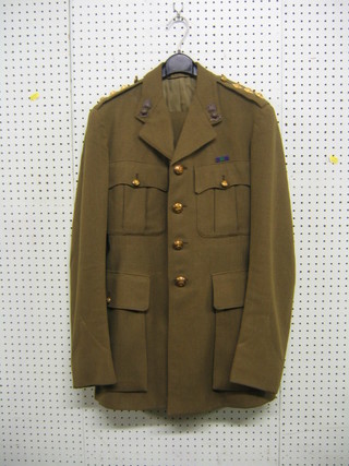 A Royal Artillery captains service dress jacket and trousers by J Daniels & Co, 39 Conduit St