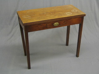 A 19th Century mahogany tea table, the base fitted a drawer, raised on square tapering supports 33" (some ring marks to top and damage to front right hand side)