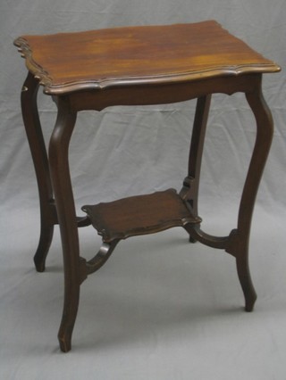 An Edwardian rectangular mahogany 2 tier occasional table raised on cabriole supports 24"