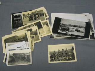 A collection of WWII black and white photographs of tanks and Germans in uniform, barrack life etc