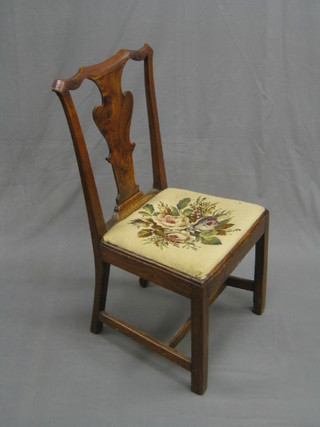 An 18th Century elm splat back Queen Anne style dining chair with upholstered drop in seat, raised on square tapering supports (old repair to back left leg)