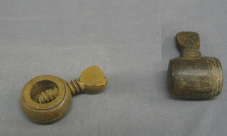 2 19th Century turned wooden nut crackers