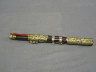 A 19th/20th Century Oriental bamboo and embossed metal travelling eating set comprising knife and 2 chop sticks