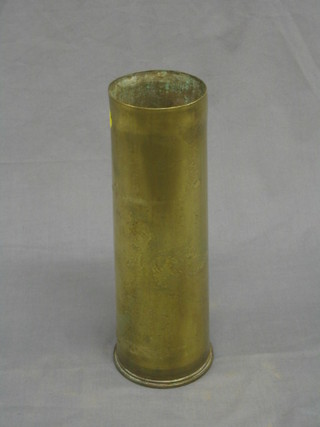 An 18lbs brass shell case
