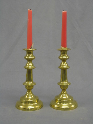 A pair of 19th Century brass candlesticks 9"