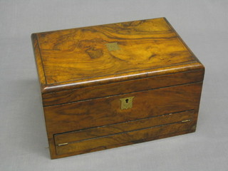 A Victorian figured walnut trinket box with hinged lid, the base fitted a writing slope with stationery box (missing pen rest and requires some attention) 13"