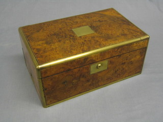 A Victorian figured walnut writing slope with brass banding and square brass panel to the centre, the base fitted a drawer (brass on corners gently rising and veneer damage to top of drawer) 18"