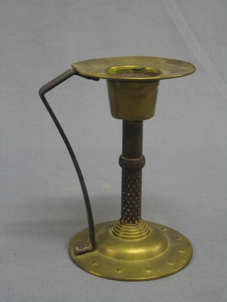 A German Art Nouveau iron and brass candlestick, the base marked Goberg Gesch 8" (NB removed from a German bomb site)