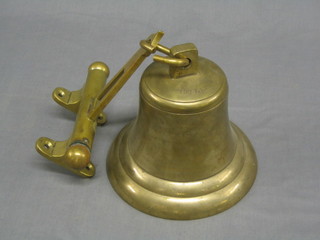 A brass "ships bell", bell marked 1977.1.20 complete with brass bracket marked Milward