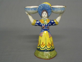 A Quimper double sided salt in the form of a standing lady with 2 circular panniers, the base marked Masonic (1 bowl f and r) 7"