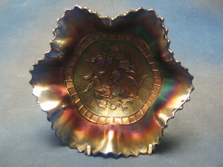 An American blue Carnival glass bowl decorated wind flowers 8"
