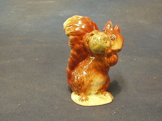 A Beswick Beatrix Potter figure Squirrel Nutkin, gold mark to base and marked Squirrel Nutkin F Warne & Co Ltd Copyright