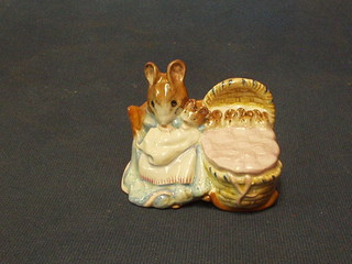 A Beswick Beatrix Potter figure Hunca Munca, brown mark to base and dated 1951