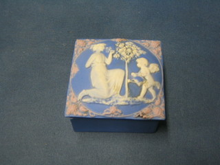 A Mary Gregory style biscuit porcelain trinket box and cover, the lid decorated a lady gardener 3 1/2"