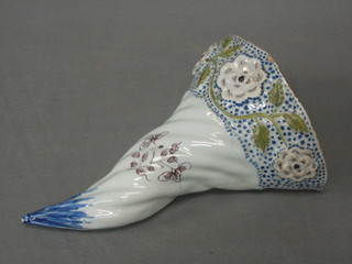 A 20th Century French porcelain wall pocket in the form of a cornucopia (slight chip) 6"