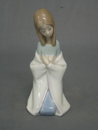 A Lladro figure of a kneeling girl 6"