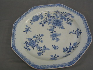 A 19th Century Oriental blue and white porcelain charger of octagonal form with floral decoration 16"