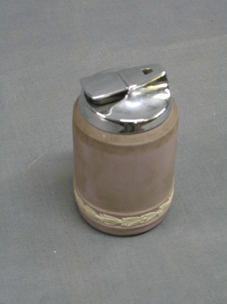 A Ronson lighter contained within a  pink Wedgwood Jasperware base, marked Wedgwood 80