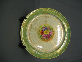 A Royal Worcester circular porcelain plate, reverse marked Ellis Bros. Ltd Toronto 