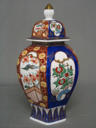 A 20th Century Imari style urn and cover 13"