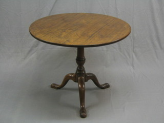 A handsome circular Georgian mahogany snap top table raised on a gun barrel and tripod column (good old top with replacement bearers) 34"
