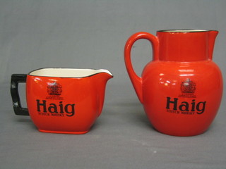 A red glazed Carltonware Haig whisky water jug and 1 other