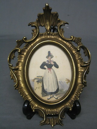 An 18th/19th Century watercolour drawing "Standing Welsh Lady beside a Bedside Cabinet" marked F U 4" oval
