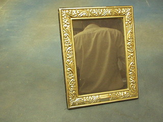 A modern embossed silver easel photograph frame 9"