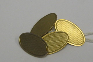 A pair of gentleman's 9ct gold oval cufflinks