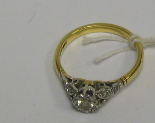 A lady's gold illusion diamond set dress  ring set 6 small diamonds to the shoulders