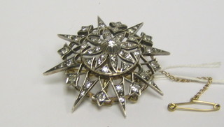 A lady's  attractive star brooch set 49 diamonds 