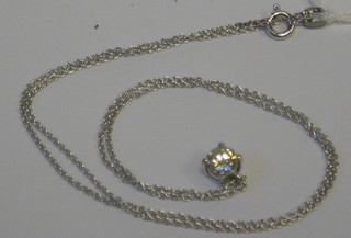 A lady's solitaire diamond pendant (approx 1/2ct)