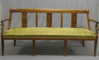 A 19th Century Continental walnut bar back settee with slat back, inlaid brass throughout, upholstered seat and raised on swan terminals (back with 2 old breaks) 73"