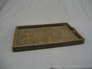 A heavily carved oak twin handled tea tray carved floral and vinery decoration 21"