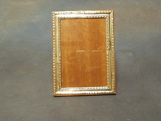 A modern rectangular embossed silver easel photograph frame 7"