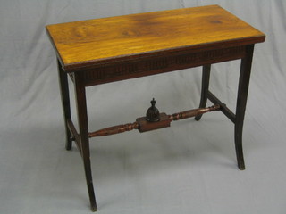 A Victorian rectangular rosewood aesthetic movement card table, raised on outswept supports united by a well turned H framed stretcher with dome to the centre 36"
