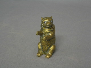 A brass vesta case in the form of a standing bear, set hardstone eyes, 3" with hinged lid