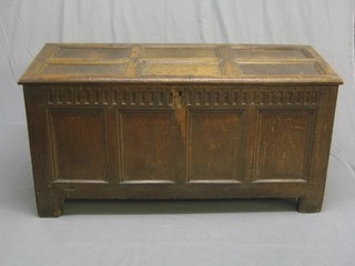 A 17th/18th Century oak coffer of panelled construction with butterfly hinges, the front with arcaded decoration, 53"