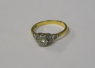 A lady's gold illusion diamond set dress  ring set 6 small diamonds to the shoulders