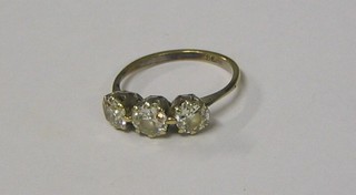 A lady's 9ct gold dress ring set 3 large diamonds