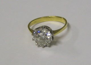 A lady's gold engagement/dress ring set a large diamond