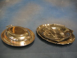 An  oval silver plated entree dish and cover, an oval dish with cut glass centre, a chromium plated cake basket and a pair of sandwich servers