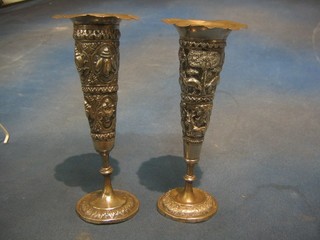 A pair of Eastern embossed silver vases 8"