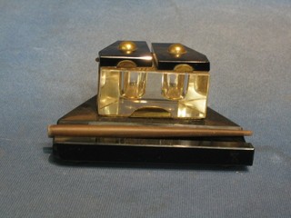 An  Art Deco glass twin compartment ink well and dip pen