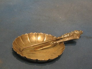 A Victorian circular silver dish, London 1893, 3", a silver handled butter hook and a nail file