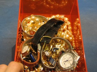 A collection of costume jewellery and costume watches