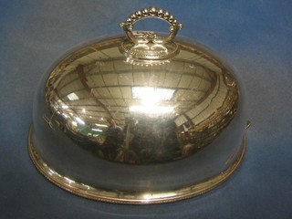 An oval silver plated meat cover 14"