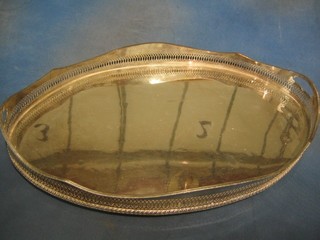 An oval galleried silver plated tea tray 24"