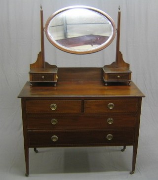 An Edwardian inlaid mahogany dressing chest with oval mirror, fitted 2 glove drawers above 2 short and 2 long drawers, raised on square tapering supports 43"